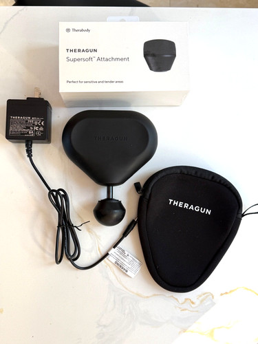 Theragun mini with - mini, attachment